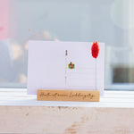 Postkarte mit "Dackel im Bouquet"