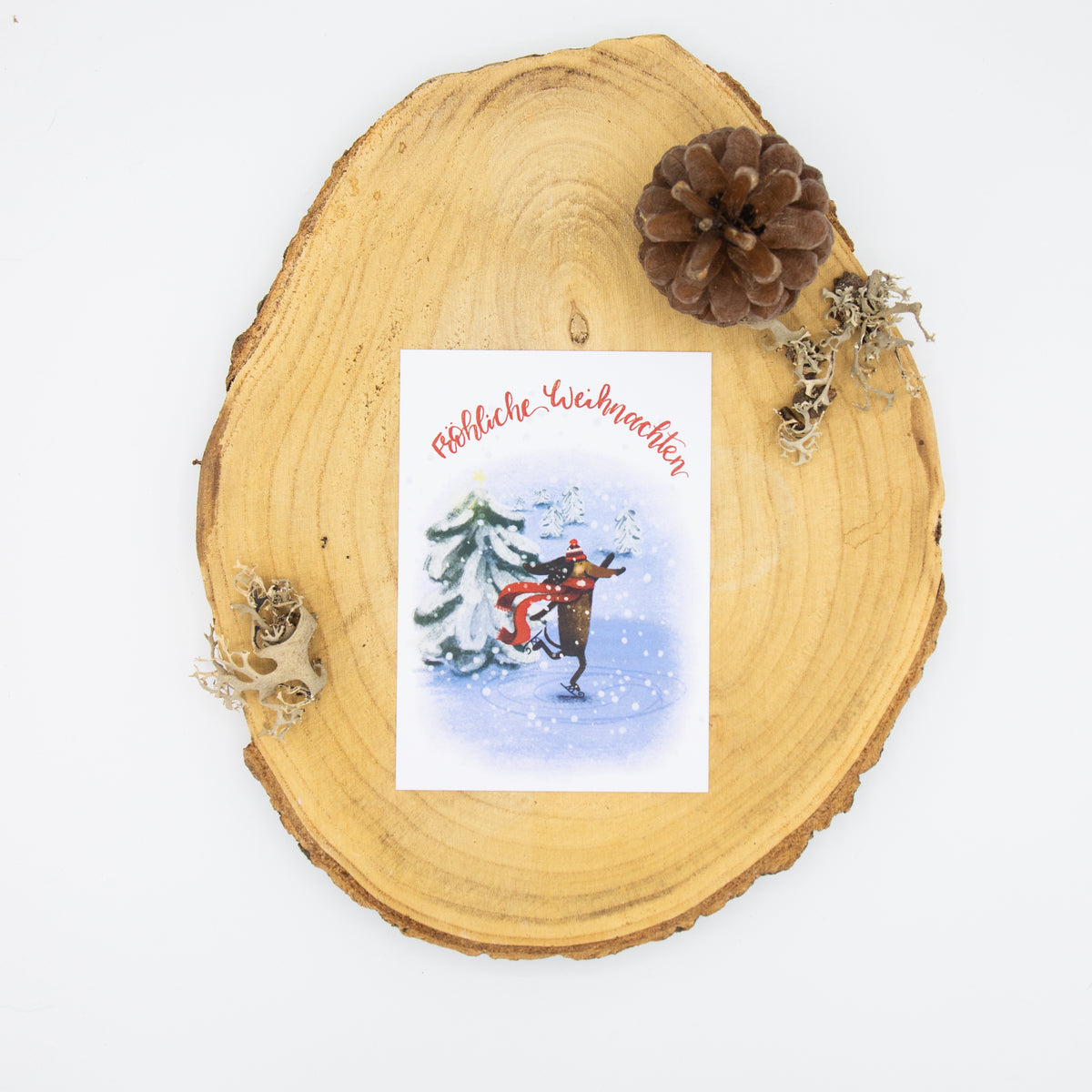 Weihnachtskarte Dackel läuf Schlittschuh