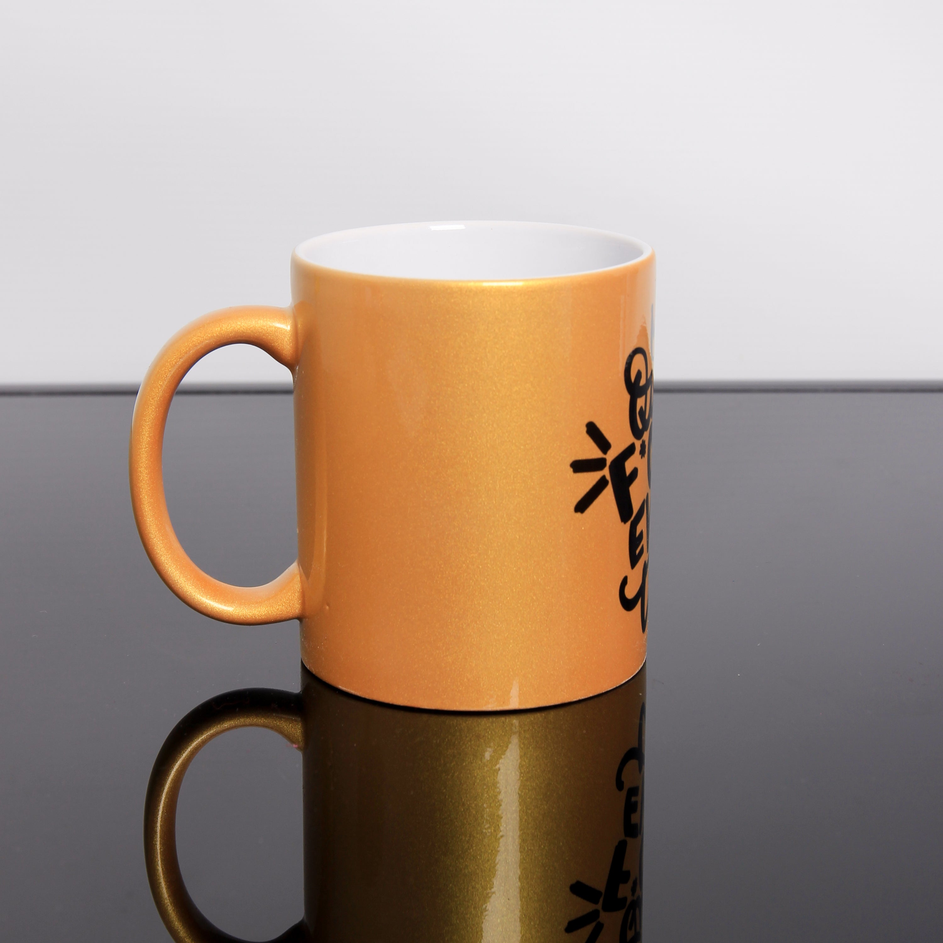 Gold Tasse 